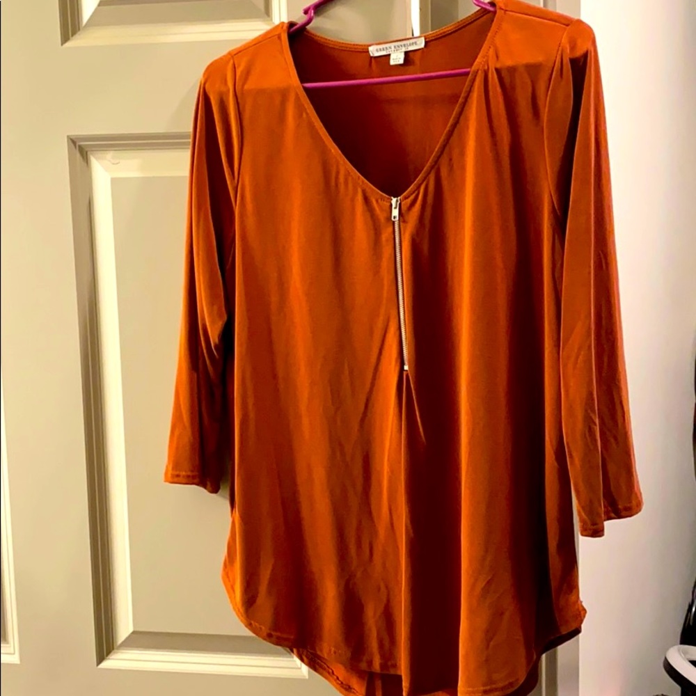 Rust colored blouse